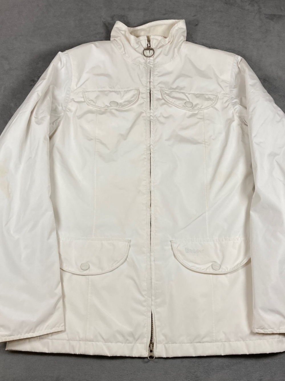 Barbour women’s waterproof jacket with flaws